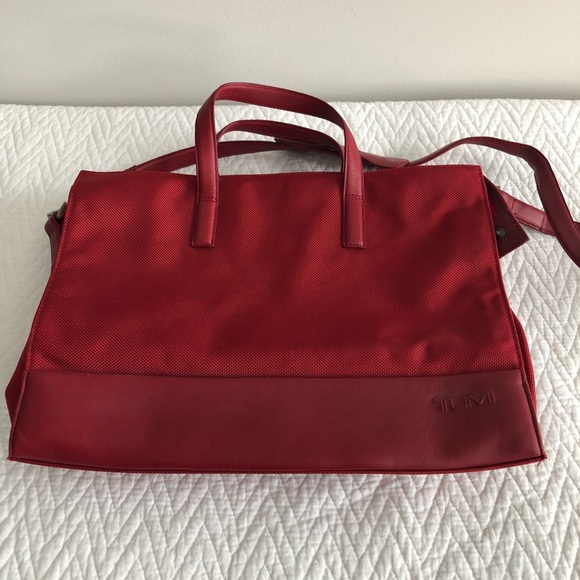 tumi red luggage